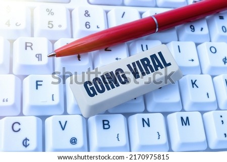Text showing inspiration Going Viral. Business approach image video or link that spreads rapidly through population Businessman in suit holding tablet symbolizing successful teamwork.