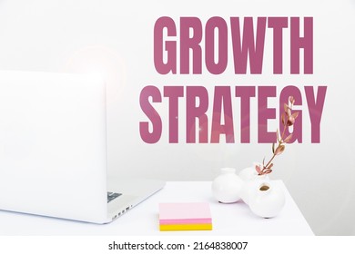 Text showing inspiration Growth Strategy. Business concept Strategy aimed at winning larger market share in shortterm Tidy Workspace Setup, Writing Desk Tools Equipment, Smart Office - Shutterstock ID 2164838007