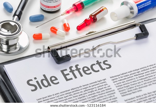 The text Side\
Effects written on a\
clipboard