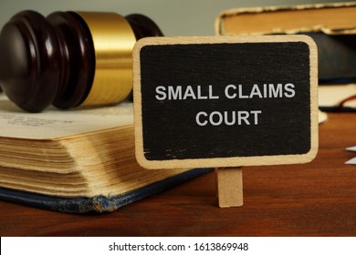 Text sign showing hand written words small claims court