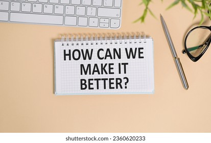 Text sign showing How Can We Make It Better question. Conceptual photo asking how increase quality of product Man holding marker notebook clothespin reminder yellow table and keyboard. - Shutterstock ID 2360620233