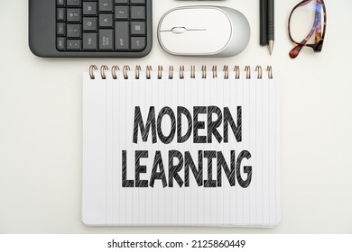 Text Sign Showing Modern Learning. Concept Meaning Flexible And Agile Setup Innovative Learning Environments Office Supplies Over Desk With Keyboard And Glasses And Coffee Cup For Working