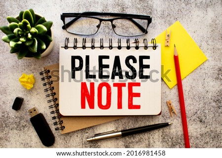 Text sign showing Please Note. Conceptual photo formal way to direct showing s is attention to some information Flat lay above table with pc keyboard and copy space paper for text messages.
