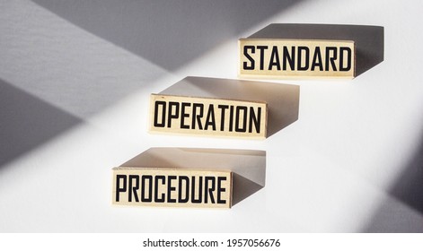 Text Sign Showing Standard Operating Procedure, Text Written On Wood Blocks. Conceptual Photo Detailed Instructions On How To Complete The Routine Work.