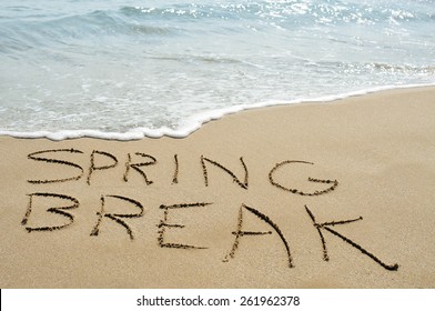 The Text Spring Break Written In The Sand Of A Beach