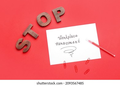 Text STOP WORKPLACE HARASSMENT With Stationery On Color Background