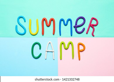 Text SUMMER CAMP Made Of Modelling Clay On Color Background, Flat Lay