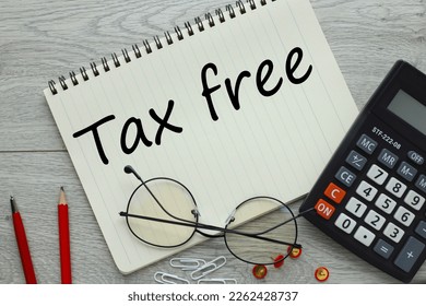 Text tax free. red pencils and glasses near notepad with text. Financial concept. - Shutterstock ID 2262428737
