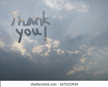 Text Thank You Writing With Clouds.  Text Against Scenic Clouds And Sky In The Background.