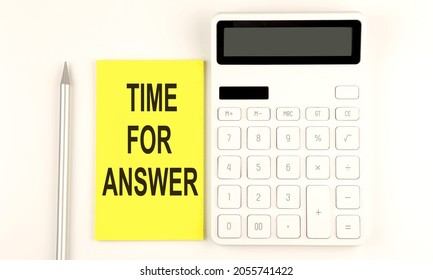 text TIME FOR ANSWER on the yellow sticker, next to pen and calculator