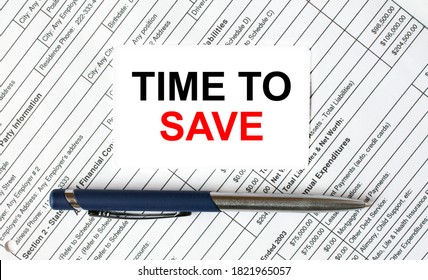 Text Time To Save written on a business card lying on financial tables with a blue metal pen. Business and financial concept