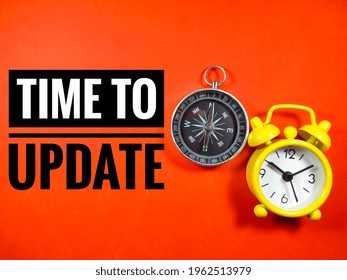 Text TIME TO UPDATE with compass and clock on red background.