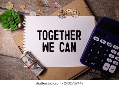 text Together we can two wooden blocks on a wooden background.