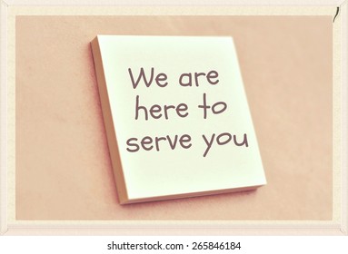 Text We Are Here To Serve You On The Short Note Texture Background