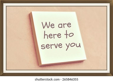 Text We Are Here To Serve You On The Short Note Texture Background