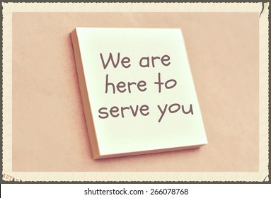 Text We Are Here To Serve You On The Short Note Texture Background