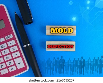 Text Written Mold Inspection At Wooden Block With Calculator And Pen On Blue Background 