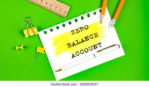 Text ZERO BALANCE ACCOUNT Sign Showing On Green Background With Office Tools