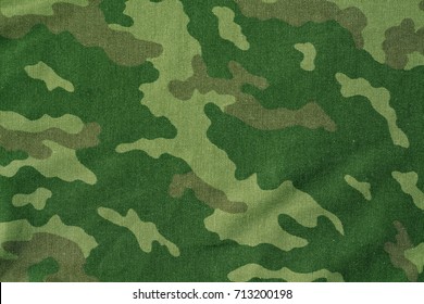 Textile camouflage uniform color background pattern. abstract background and texture for design.