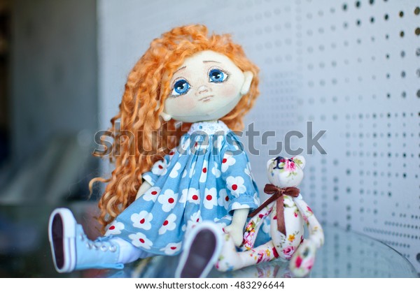 doll with red hair and freckles