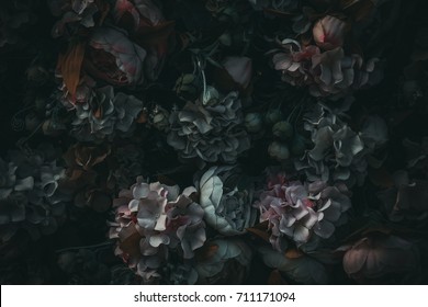 textile flowers in darkness