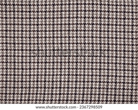 Textile of Houndstooth in Plaid pattern, Loincloth pattern, Tartan pattern, Check pattern from white and black cotton or yarn.