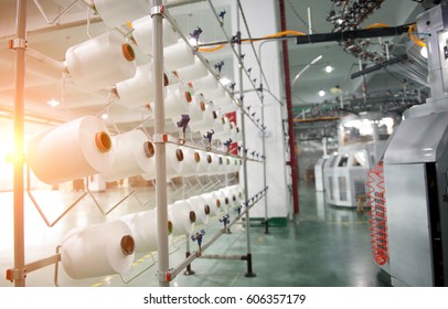 Textile Industry - Yarn Spools On Spinning Machine In A Textile Factory