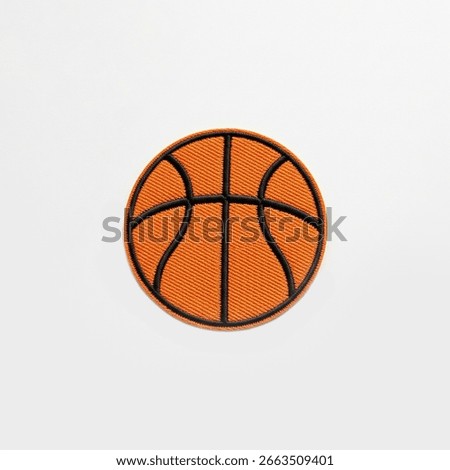 textile patch in the form of a basketball on a white background