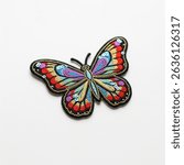 textile patch in the form of a butterfly on a white background