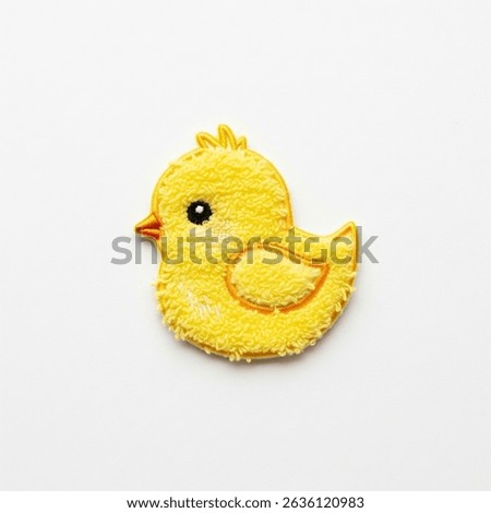 Textile patch in the form of a chicken on a white background