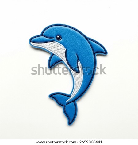 textile patch in the form of a dolphin on a white background