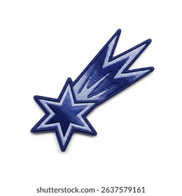 textile patch in the form of a falling star on a white background