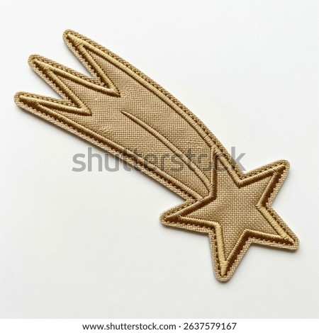 textile patch in the form of a falling star on a white background