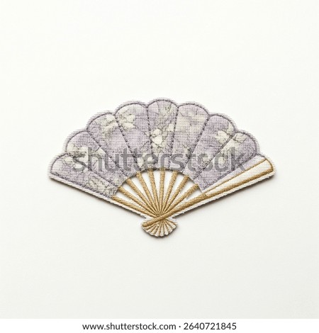 textile patch in the form of a fan on a white background