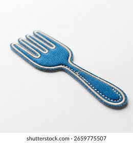 textile patch in the form of a fork on a white background