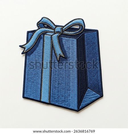 Textile patch in the form of a gift bag on a white background