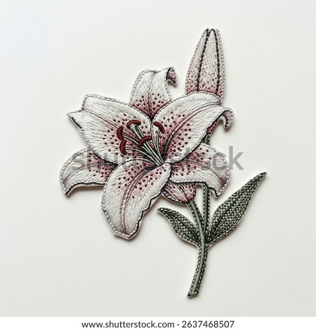 Textile patch in the form of a lily flower on a white background