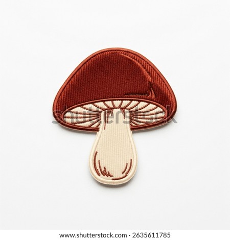 textile patch in the form of a mushroom on a white background