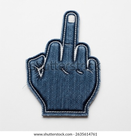 textile patch in the form of a raised middle finger on a white background