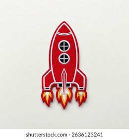 textile patch in the form of a rocket on a white background