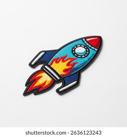 textile patch in the form of a rocket on a white background - Powered by Shutterstock - Get 15% off with code: PIKWIZARD15