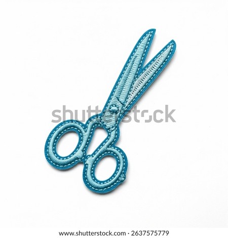 textile patch in the form of scissors on a white background