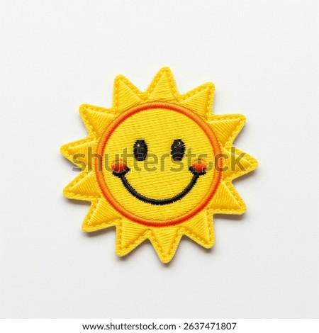 Textile patch in the form of a sun on a white background
