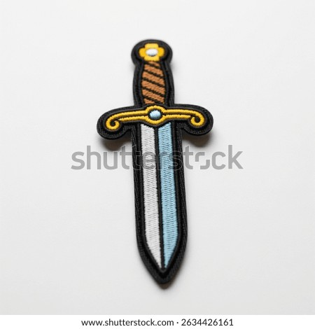 textile patch in the form of a sword on a white background