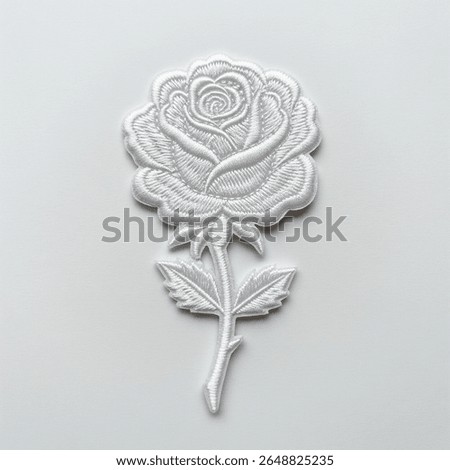 textile patch in the form of a white rose