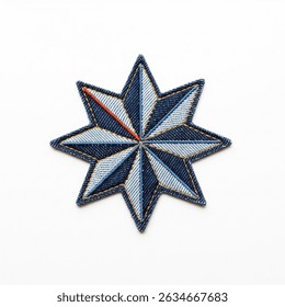 Textile patch in the form of a wind rose star on a white background