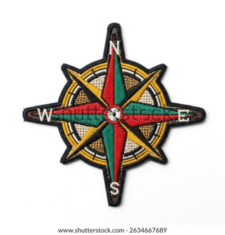 Textile patch in the form of a wind rose star on a white background