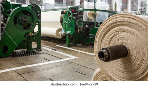 Textile Roll Factory Fabric Mill Textile Factory With Roll In Foreground And Machines In Background Textile Roll Factory Fabric Mill Line Plant Interior Active Work Machine Activity Texture Weaving In