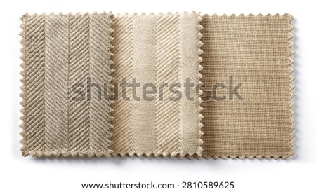 The textile samples display distinct textured surfaces, including raised chevron zigzag lines and a classic basketweave grid pattern with pinked edges, neatly isolated on a white background.