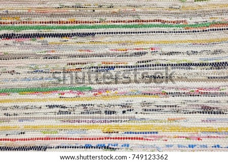 Textile Texture, Close Up of Colrful Fabric Carpet or Doormat Pattern Background.